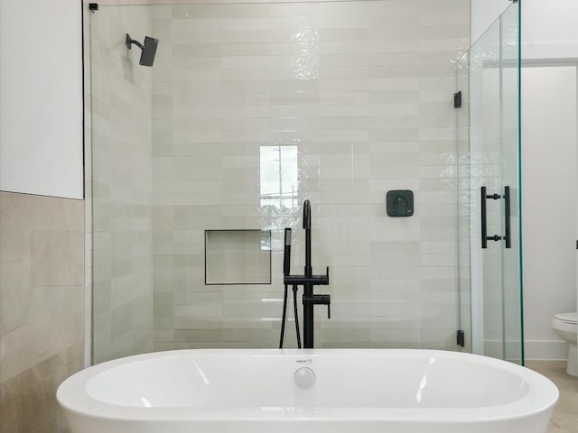 7420 Maxroy St, Houston, TX 77088 - full bathroom with a stall shower and a freestanding bath