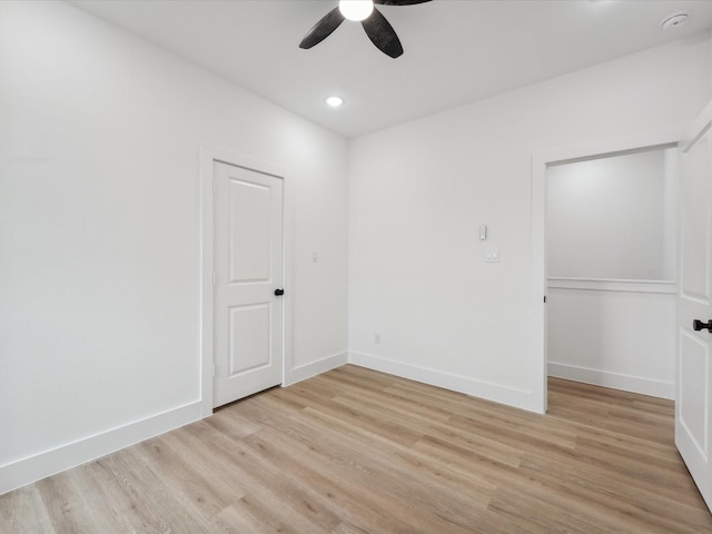 7420 Maxroy St, Houston, TX 77088 - unfurnished room with a ceiling fan, light wood-style floors, and recessed lighting