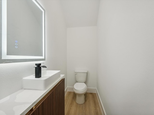 7420 Maxroy St, Houston, TX 77088 - bathroom featuring vanity and wood finished floors