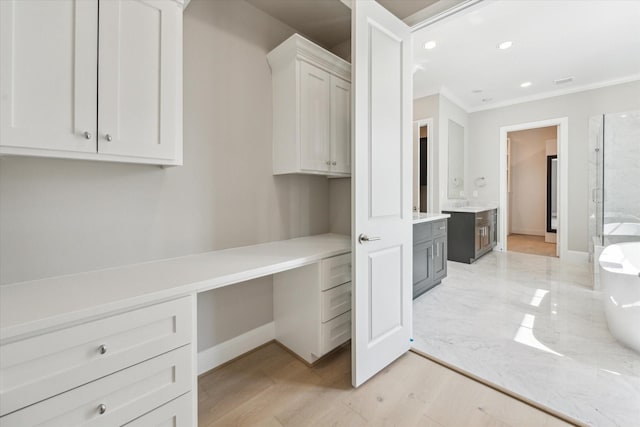 7515 Little Caprese Ln, Houston, TX 77055 - unfurnished office with crown molding, recessed lighting, and light wood-type flooring