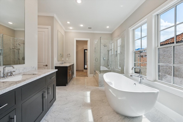 7515 Little Caprese Ln, Houston, TX 77055 - bathroom with a shower stall, two vanities, marble tiled flooring, ornamental molding, and a freestanding tub