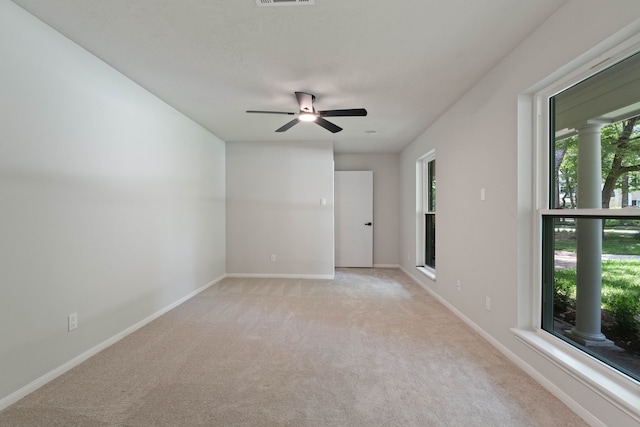 10813 Colony Wood Pl, The Woodlands, TX 77380 - unfurnished room featuring light colored carpet and a ceiling fan