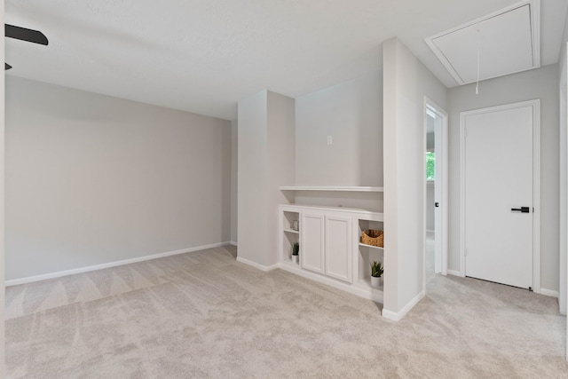 10813 Colony Wood Pl, The Woodlands, TX 77380 - unfurnished room with attic access and light carpet