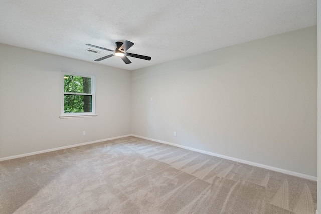 10813 Colony Wood Pl, The Woodlands, TX 77380 - spare room with a ceiling fan and light carpet