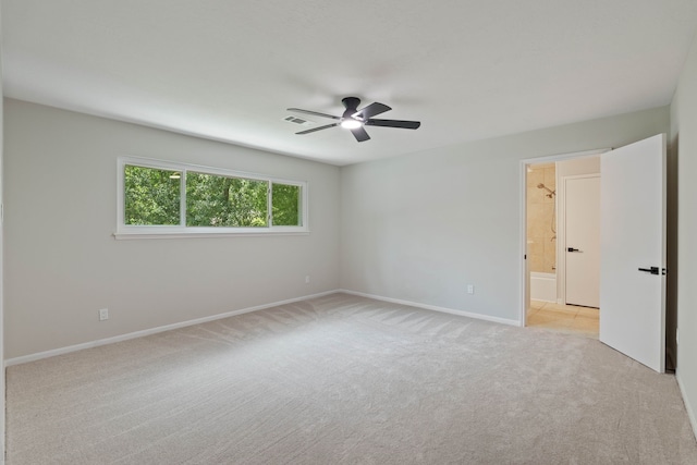 10813 Colony Wood Pl, The Woodlands, TX 77380 - empty room featuring light colored carpet and ceiling fan