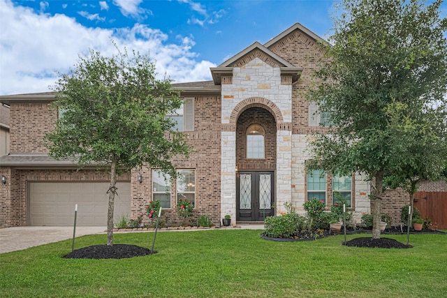 11810 White Flint Ln, Cypress, TX 77433 - view of front of house with french doors, driveway, a garage, and brick siding