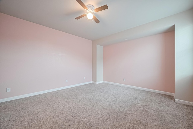 11810 White Flint Ln, Cypress, TX 77433 - carpeted empty room with a ceiling fan and baseboards