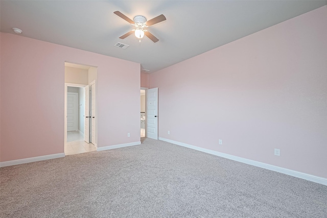 11810 White Flint Ln, Cypress, TX 77433 - unfurnished bedroom with light colored carpet and ceiling fan