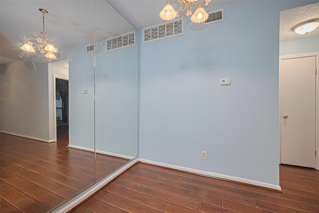 7900 N Stadium Dr Unit 123, Houston, TX 77030 - unfurnished dining area with a chandelier and wood finished floors