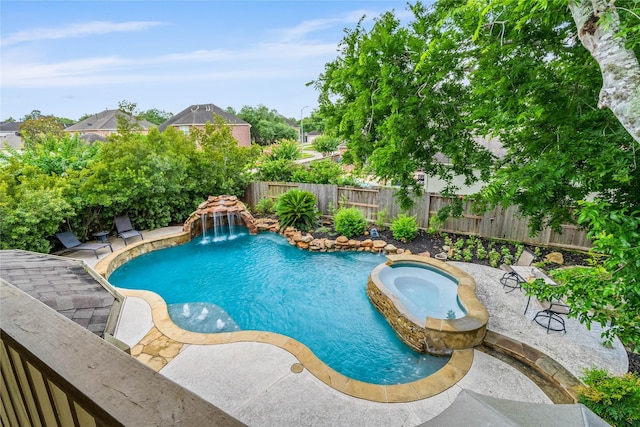 7914 Chianti Ct, Sugar Land, TX 77479 - view of pool with a pool with connected hot tub, a patio, and a fenced backyard