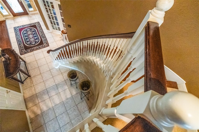 7914 Chianti Ct, Sugar Land, TX 77479 - staircase featuring tile patterned floors