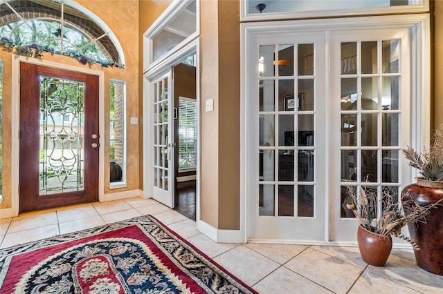 7914 Chianti Ct, Sugar Land, TX 77479 - tiled entryway featuring french doors and baseboards