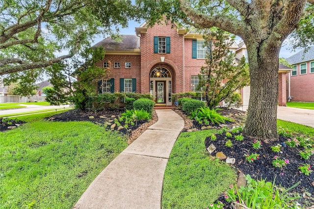 7914 Chianti Ct, Sugar Land, TX 77479 - view of front of property featuring brick siding and a front lawn