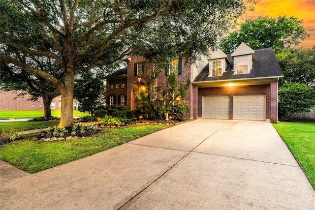 7914 Chianti Ct, Sugar Land, TX 77479 - view of front of house featuring brick siding, concrete driveway, and a front lawn