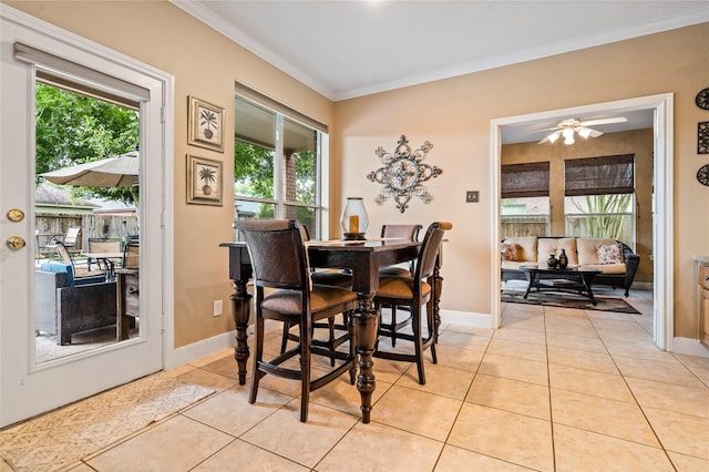 7914 Chianti Ct, Sugar Land, TX 77479 - dining room with crown molding, light tile patterned flooring, and ceiling fan