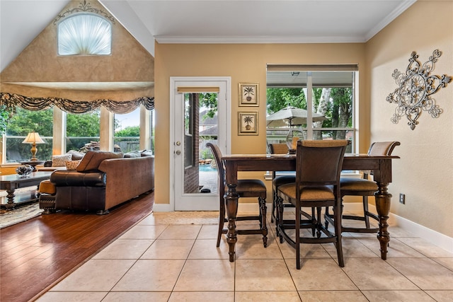 7914 Chianti Ct, Sugar Land, TX 77479 - dining space with ornamental molding and light tile patterned floors