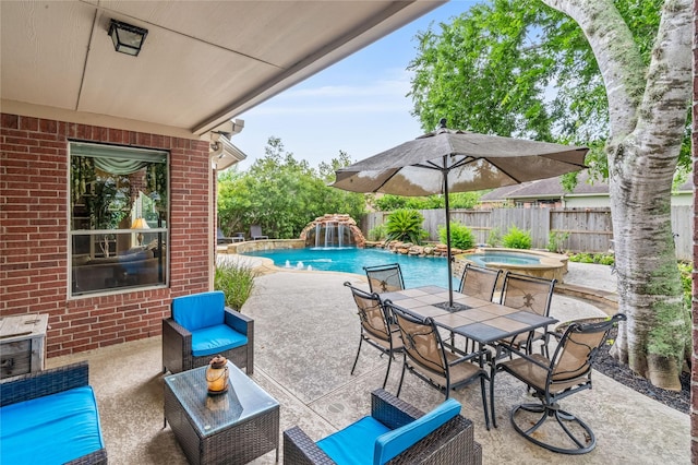 7914 Chianti Ct, Sugar Land, TX 77479 - view of patio / terrace featuring outdoor dining area, a pool with connected hot tub, and outdoor lounge area