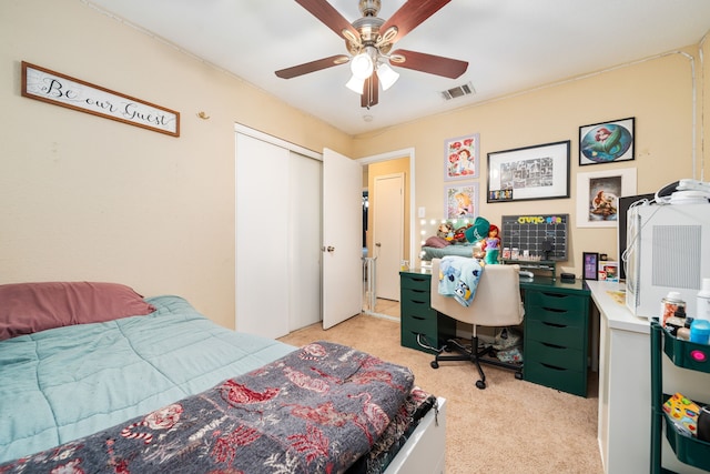 735 Red Rock Canyon Dr, Katy, TX 77450 - bedroom featuring light colored carpet, a closet, a desk, and ceiling fan