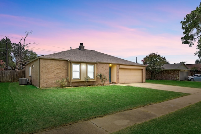 735 Red Rock Canyon Dr, Katy, TX 77450 - view of front facade with concrete driveway, an attached garage, brick siding, and roof with shingles