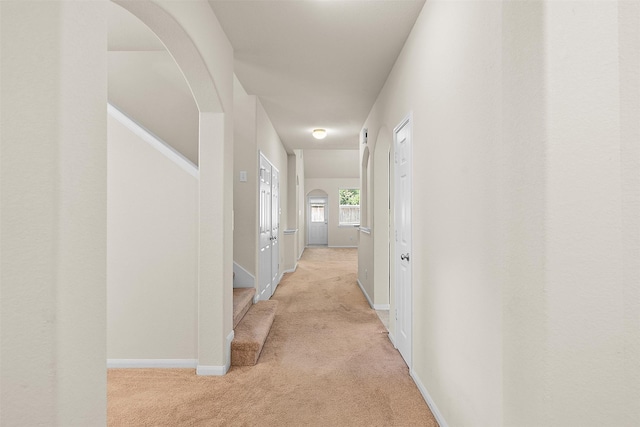 6439 Wilshire Rdg, Houston, TX 77040 - hallway featuring light colored carpet and arched walkways
