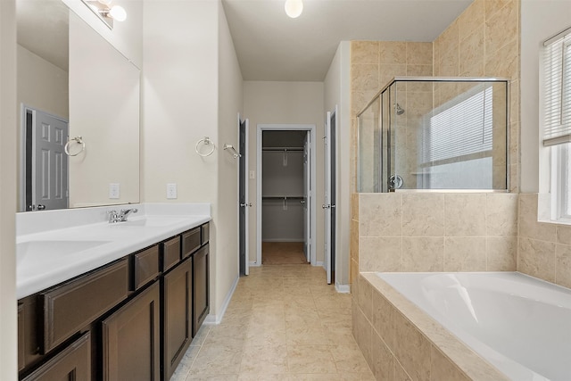 6439 Wilshire Rdg, Houston, TX 77040 - bathroom with a shower stall, a garden tub, double vanity, and a walk in closet