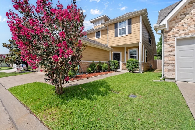 6439 Wilshire Rdg, Houston, TX 77040 - view of front of home featuring driveway, a front lawn, stone siding, and a garage