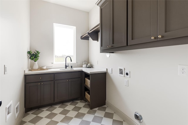 1355 Bluebonnet Ridge Dr, Chappell Hill, TX 77426 - laundry area with electric dryer hookup, light flooring, cabinet space, and hookup for a gas dryer