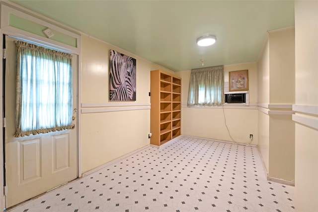 4007 Wedgewood St, Houston, TX 77093 - entrance foyer featuring cooling unit and ornamental molding