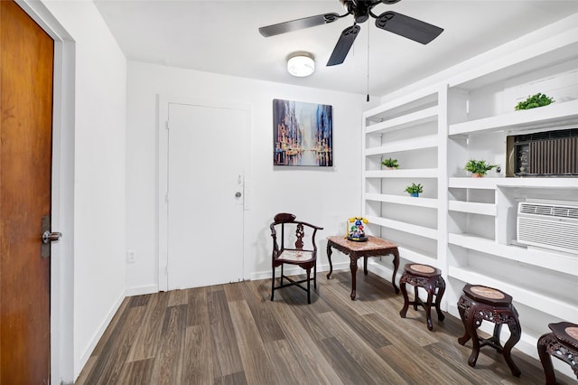 4007 Wedgewood St, Houston, TX 77093 - sitting room featuring dark wood finished floors, a ceiling fan, and built in features