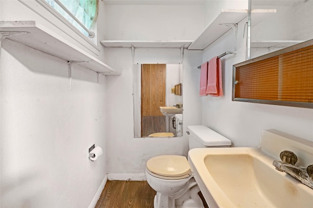 4007 Wedgewood St, Houston, TX 77093 - bathroom featuring toilet and wood finished floors