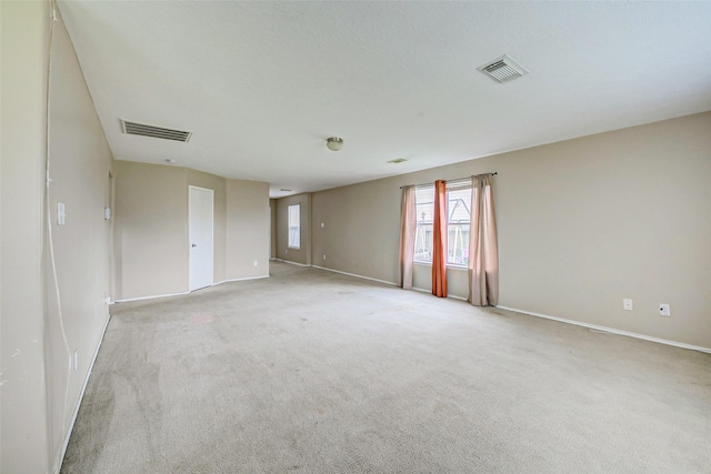 11303 Canyon Shore Dr, Humble, TX 77396 - unfurnished room featuring light colored carpet and baseboards