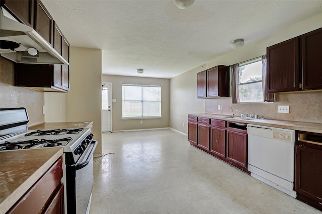 11303 Canyon Shore Dr, Humble, TX 77396 - kitchen with range with gas cooktop, dishwasher, under cabinet range hood, a textured ceiling, and backsplash