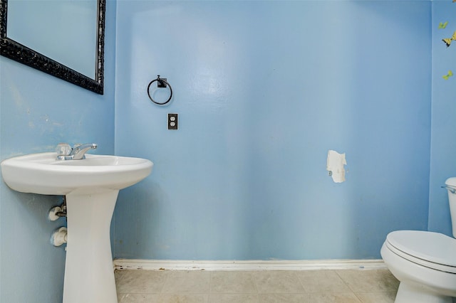 11303 Canyon Shore Dr, Humble, TX 77396 - half bath with tile patterned floors