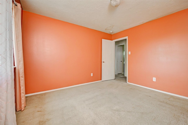 11303 Canyon Shore Dr, Humble, TX 77396 - carpeted empty room with baseboards and a smoke detector