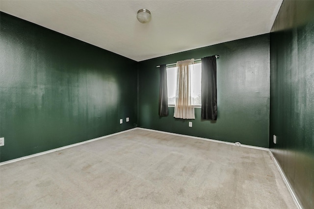 11303 Canyon Shore Dr, Humble, TX 77396 - carpeted empty room featuring baseboards