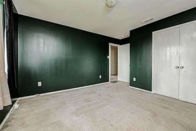 11303 Canyon Shore Dr, Humble, TX 77396 - unfurnished bedroom with carpet floors and a closet
