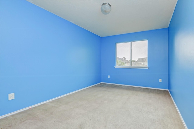 11303 Canyon Shore Dr, Humble, TX 77396 - unfurnished room featuring carpet floors and baseboards