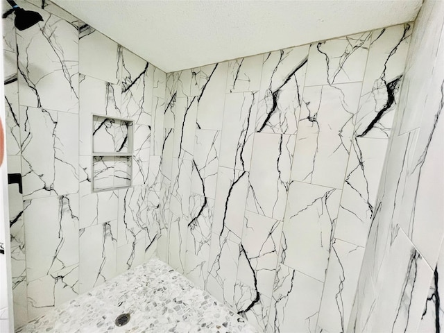 17909 Pine St Unit A, Crosby, TX 77532 - full bath featuring a marble finish shower and a textured ceiling