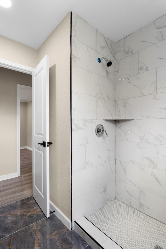 3406 W Cedar Bayou Lynchburg Rd, Baytown, TX 77521 - full bath featuring tiled shower and marble look tile flooring