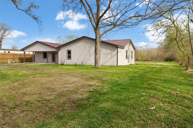3406 W Cedar Bayou Lynchburg Rd, Baytown, TX 77521 - back of house featuring a metal roof