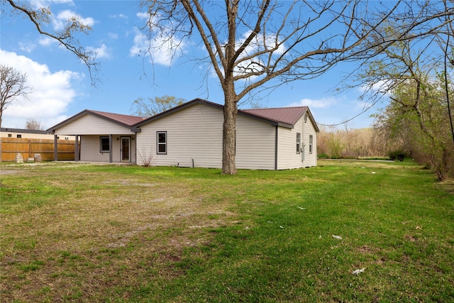 3406 W Cedar Bayou Lynchburg Rd, Baytown, TX 77521 - back of property featuring a metal roof