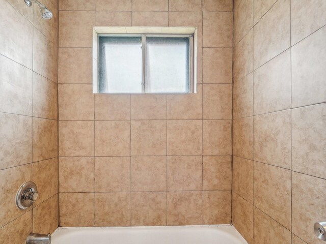 4901 Ripple Creek Dr, Baytown, TX 77521 - bathroom featuring tub / shower combination