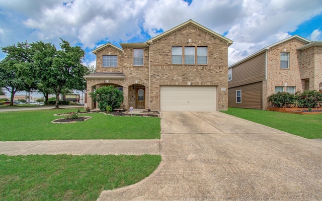 21522 Amesbury Meadow Ln, Spring, TX 77379 - traditional-style house featuring brick siding, an attached garage, concrete driveway, and a front lawn