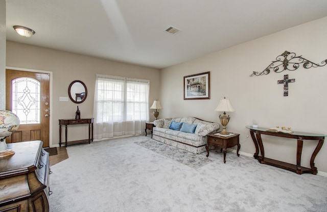 21522 Amesbury Meadow Ln, Spring, TX 77379 - carpeted living room featuring plenty of natural light
