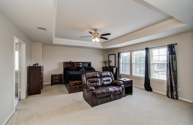 21522 Amesbury Meadow Ln, Spring, TX 77379 - bedroom with a raised ceiling, light colored carpet, crown molding, and ceiling fan