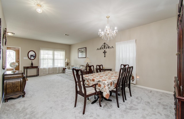21522 Amesbury Meadow Ln, Spring, TX 77379 - dining area with light carpet and a chandelier