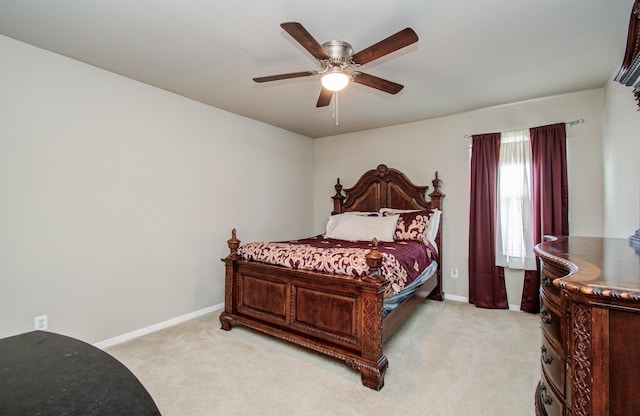 21522 Amesbury Meadow Ln, Spring, TX 77379 - bedroom with light colored carpet and a ceiling fan