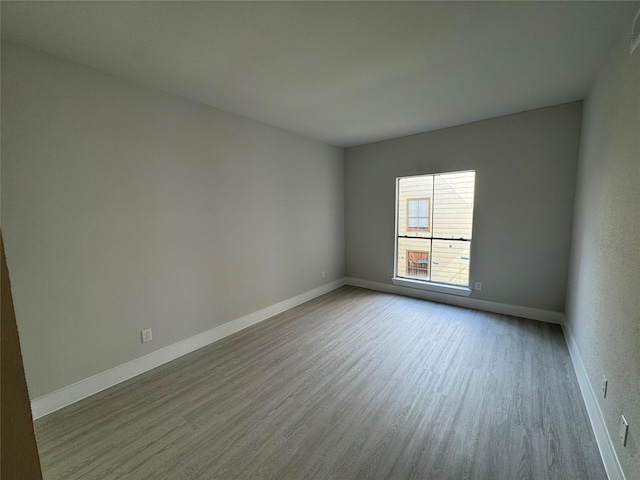 9803 Club Creek Dr Unit 134, Houston, TX 77036 - spare room with wood finished floors and baseboards