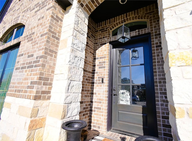 18923 Toscana Ln, New Caney, TX 77357 - property entrance featuring brick siding