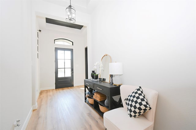 18923 Toscana Ln, New Caney, TX 77357 - entrance foyer with light wood finished floors and baseboards